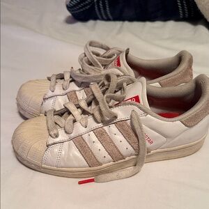 Women’s White and Tanish Red adidas superstars